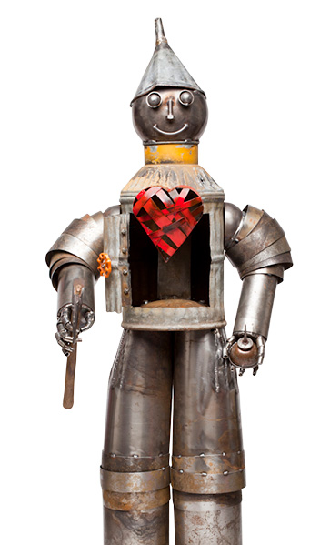 Recycled metal tin man with heart